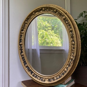 Large gold plastic mirror