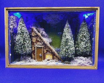 A cabin deep in the snowy forest Diorama, wooden shadow box