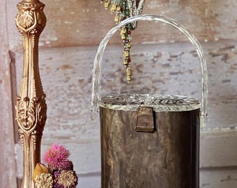 Bolso de mano Gilli Originals vintage de lucita jaspeada, años 50, con tapa y asa en forma de estrella