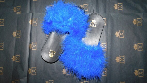 blue fuzzy slides