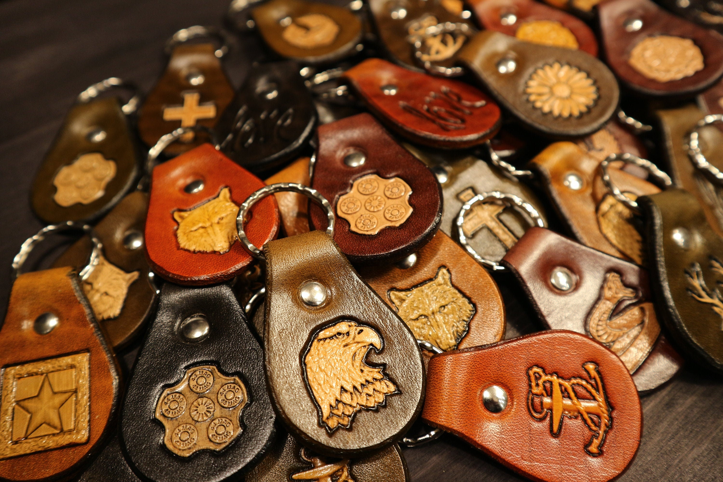 CUSTOM LEATHER KEYCHAIN with various 3D stamps, in six