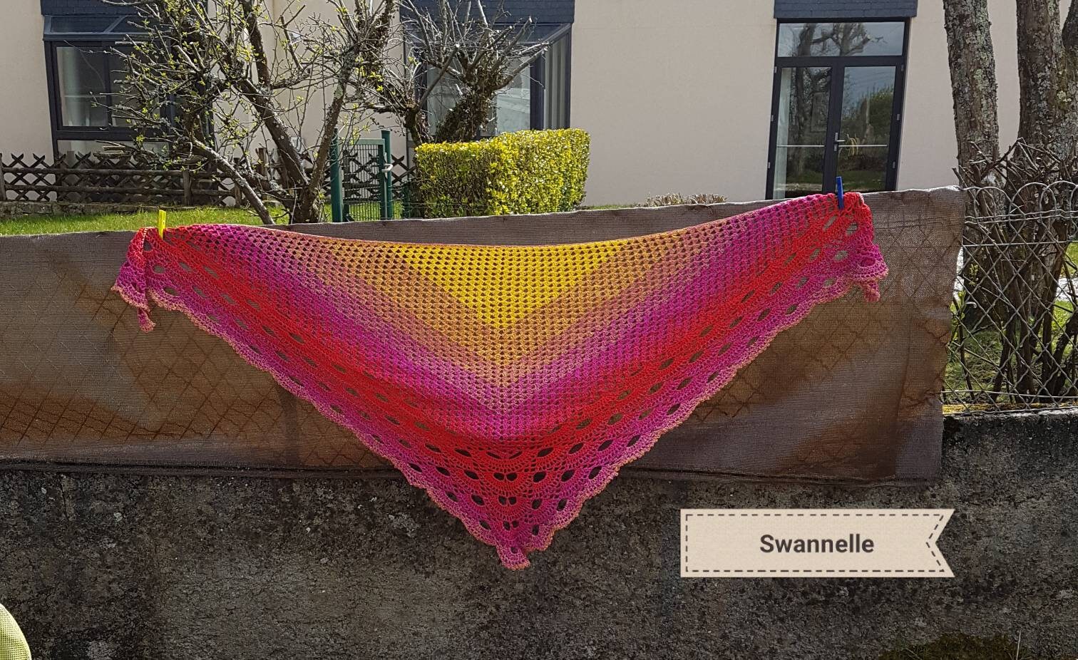 Rainbow-colored shawl or wrap, really bright and light, hooked in cotton and acrylic, pattern from Cécile Balladino