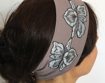 Wide and soft jersey headband for woman with embroideries available in 10 colors