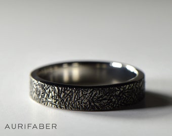 Zirconium ring with grain texture surface. Handmade zirconium ring with black details. Nordic design ring. Mens ring design. Dark zirconium.
