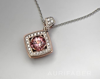 Roze toermalijnhanger met diamanten. 14k witgouden en roodgouden ketting met roze toermalijn en diamanten. Unieke sieraden.