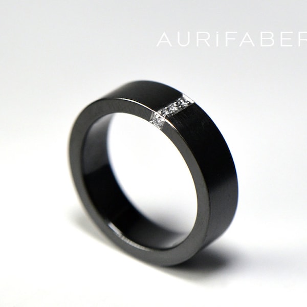 Zirconium ring with diamonds. Black zirconium band and diamonds. 5 x 0.01ct tw/vs brilliants. Satin matte texture. 5mm wide.