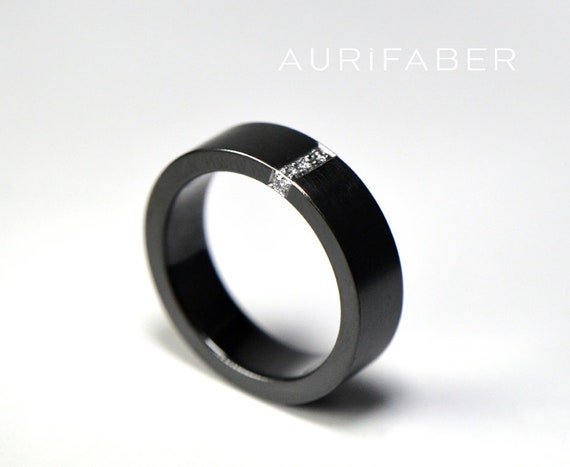 Zirconium ring with diamonds. Black zirconium band and diamonds. 5 x 0.01ct tw/vs brilliants. Satin matte texture. 5mm wide.