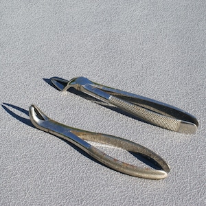 Vintage dental extractor plies two tooth removers dentists tools tooth forceps medical instruments