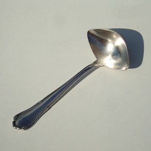 Antique Silver Plated Gravy Ladle: Ornate 1900s Serving Spoon