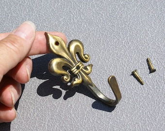 Small brass Fleur de Lis hook wall mounted metal hanger French vintage wall hook