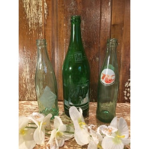 Old green glass soda bottles,set of 3,dark green bottles,RC Cola,7up,Duraglas,dark green bottle,beverages,antique soda bottle,9&quot;-11&quot; tall,