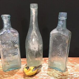 Old glass bottles,teal,blue aqua,tall embossed jars,collectible,flask,set of 3,foggy,beach decor,9",wedding decor,bathroom,decorative