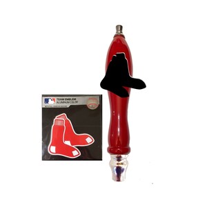 May include: Red wooden beer tap handle with a silver top. The handle has a sticker with a baseball team logo and the text "TEAM EMBLEM ALUMINUM COLOR WITH FULL ADHESIVE BACKING".