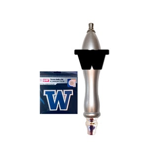 May include: A silver beer tap handle with a black "W" sticker on the top. A blue and white "W" sticker is included in the packaging. The packaging says "Team Emblem Aluminum Color".