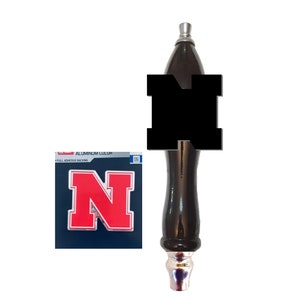 May include: A black wooden beer tap handle with a red and white "N" logo. The handle is designed for use with a beer tap.