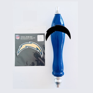 May include: A blue and silver beer tap handle with a black and yellow NFL Los Angeles Chargers team emblem sticker. The sticker says "Team Emblem Aluminum Color Full Adhesive Backing".