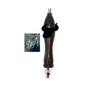 May include: A black wooden beer tap handle with a silver top and a black bull head silhouette on the top. The bull head has a green and silver logo on it.
