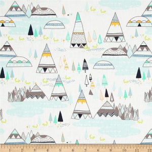 May include: White fabric with a repeating pattern of stylized mountains, trees, and geometric shapes in shades of gray, black, blue, green, and yellow.