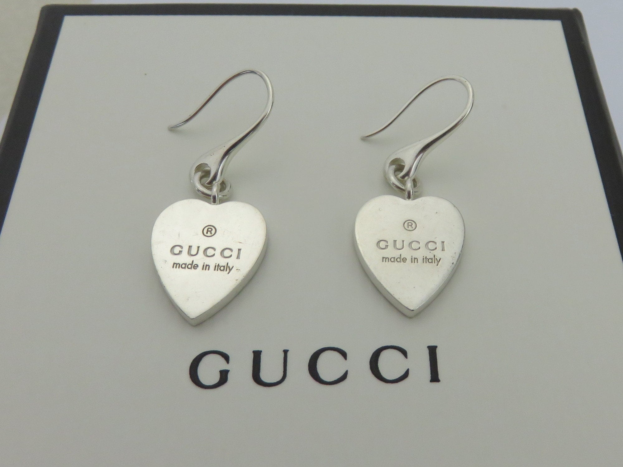 Gucci trademark silver heart earrings deals