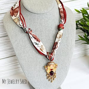 Silk Scarf Necklace: Jeweled Shield Charm, Adjustable Knotted Tie