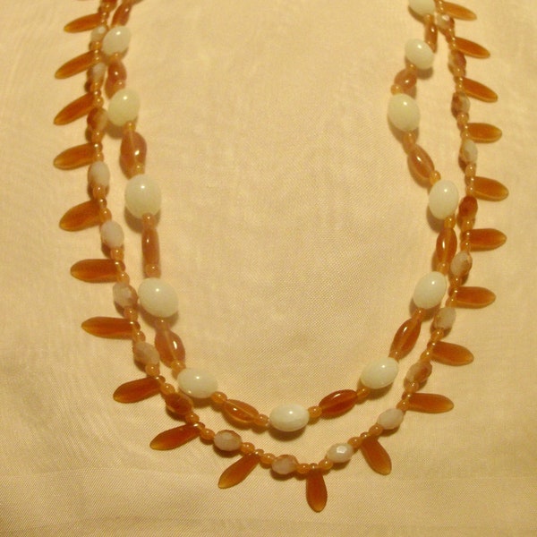 Two strand necklace, with amber daggers and milky white beads.  Czech beads and daggers.