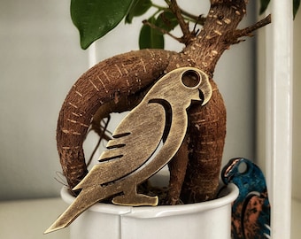 Parrot-flesopener (Paulie): staal, messing, koper of titanium sleutelhangertool