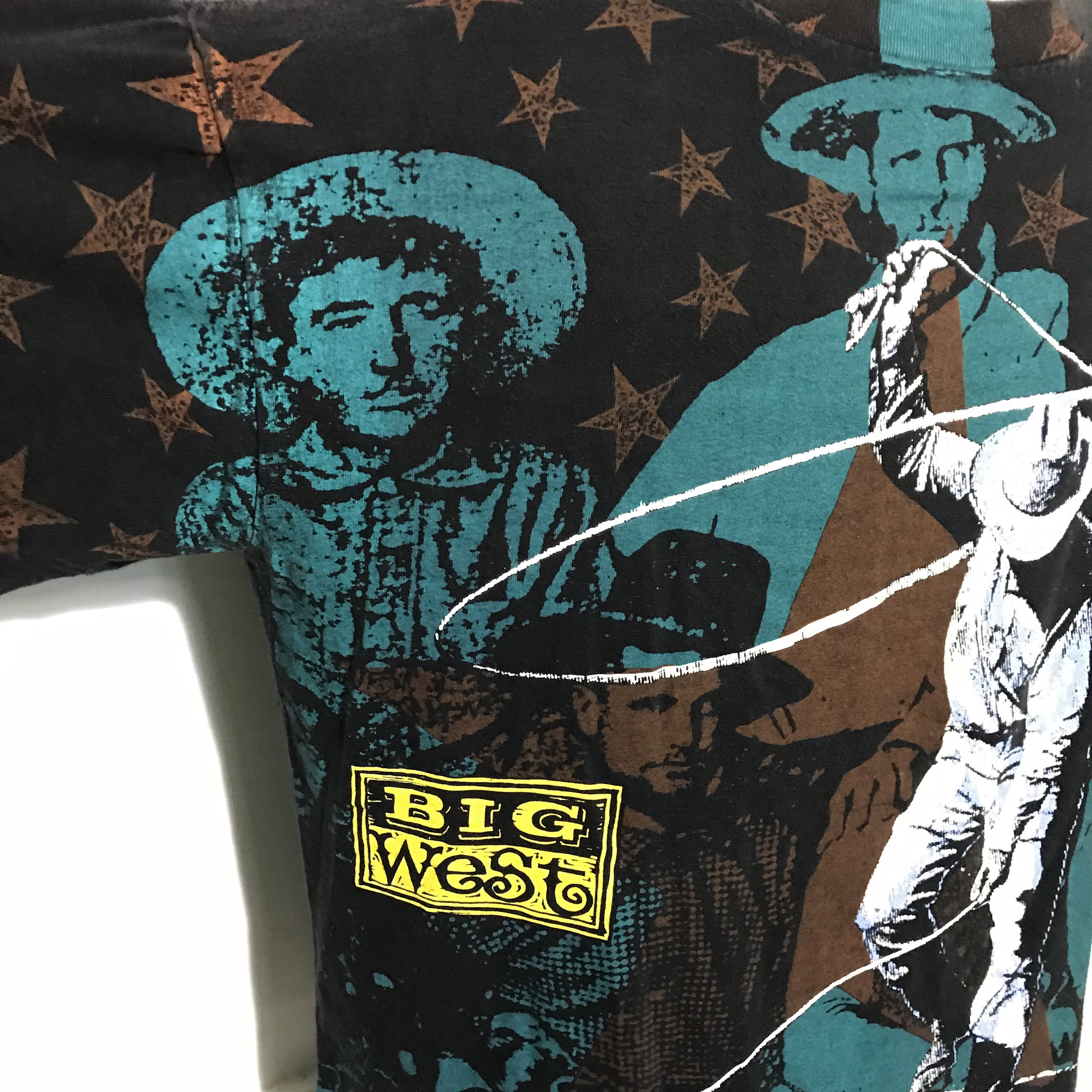 Vintage 1992 All Over Print Big West Cowboy Tee by Wild Oats Vintage 1992 All Over Print Big West Cowboy Tee by Wild Oats