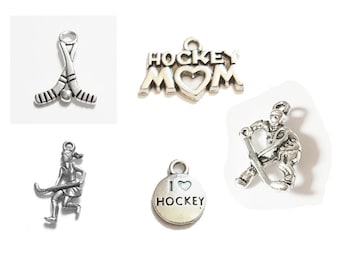 Amo los palos de hockey, la pelota, el disco, el jugador de hockey sobre césped, los deportes, el hockey, mamá. El listado es para un dije.