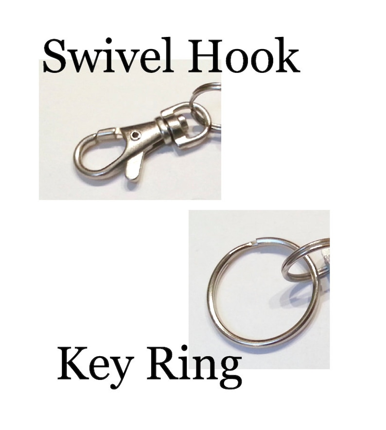 May include: A silver swivel hook attached to a silver key ring. The hook is open and ready to be attached to something.
