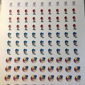 May include: A sheet of stickers featuring various characters from the animated series,  "Shimmer and Shine". The stickers feature the characters in different poses and expressions, including Shimmer, Shine, and their genie friends. The stickers are printed on a white background.