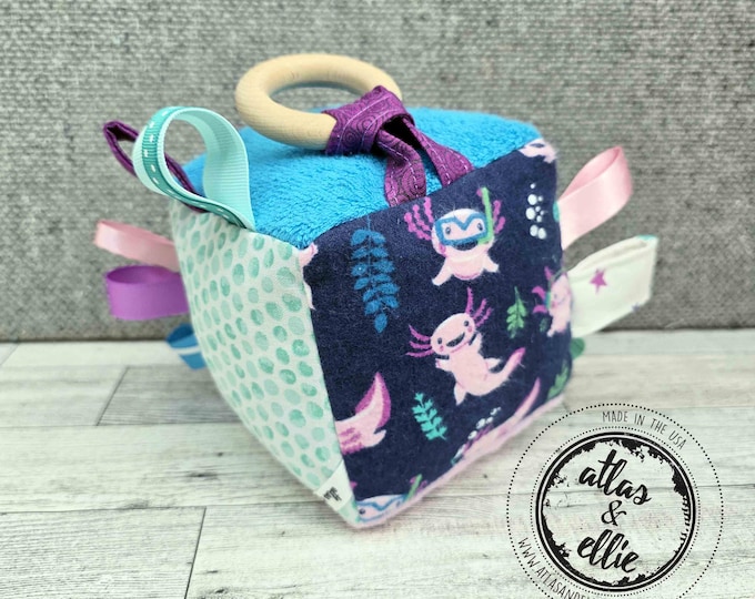 Featured listing image: Axolotl Sensory Activity Toy for Babies, Each side has textures and prints to enhance your baby's senses! Baby Shower gift