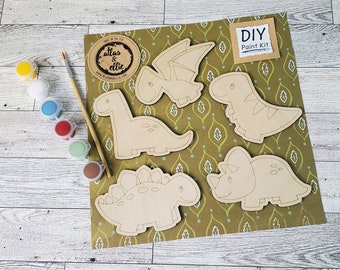 Dinosaur Paint Kit for all ages! Includes 5 cut and engraved wood pieces, 6 paint pods and 1 brush! Great craft activity!