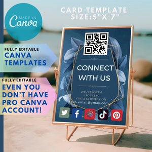 May include: A blue and gold card template with a QR code, the text "Connect with us", social media icons, and the text "@Yoursocial #Yourtag Greatwebsite.com heNo-email@gmail.com". The card is on a gold stand and the background is a blurry image of a beach.