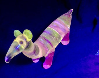Handmade collectable UV reactive glow borosilicate dinosaur art glass sculpture.Dr Sawfish 2024.