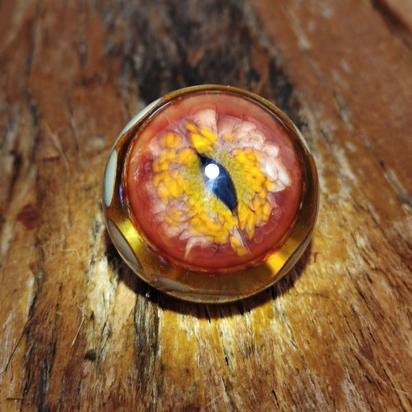 Dragon's eye of blood handmade borosilicate glass marble. Dr Sawfish 2024.