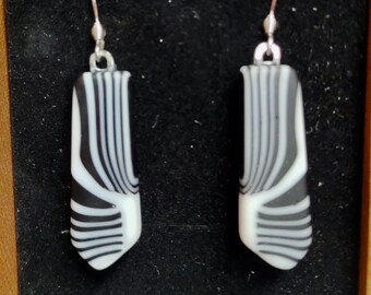 Zulu black and white fused glass dangle earrings.Dr Sawfish 2023