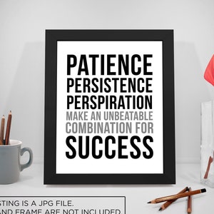 May include: Black and white motivational quote print in a black frame. The quote reads "Patience Persistence Perspiration Make an Unbeatable Combination for Success".