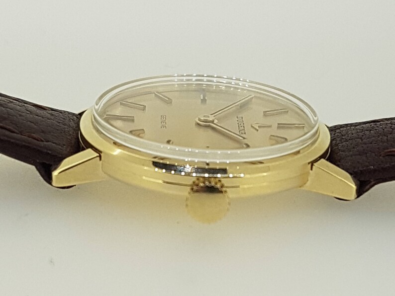 Dugena 14kt gold case, Swiss made image 5