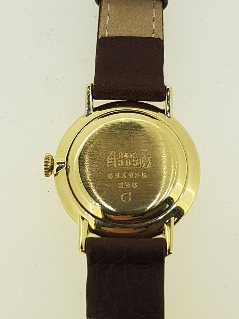 Dugena 14kt gold case, Swiss made image 4