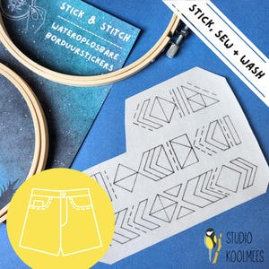 May include: A white fabric with a geometric pattern printed on it. The fabric is labeled "Stick, Sew + Wash" and "Studio Koolmees". A pair of denim shorts are shown in a yellow circle. The text "Stick & Stitch" and "Wateroplosbare BorduurStickers" is visible on a blue background.