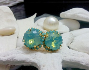 Pendientes de botón con cristales Swarovski turquesa y baño de oro