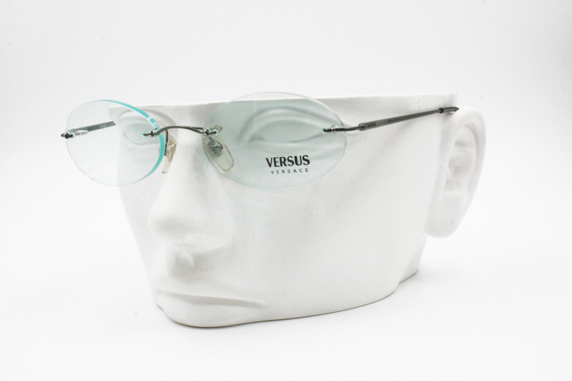 Versace rimless best sale glasses