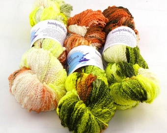 GP:249EUR/kg Slubby, merino wool with knobs "Fly", wool, hand-dyed