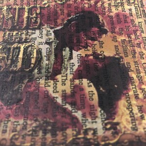 May include: A vintage book page with text about a game of cards. The text is in a brown font with a red background. The image is a collage with a photo of a person's face and hands holding cards.