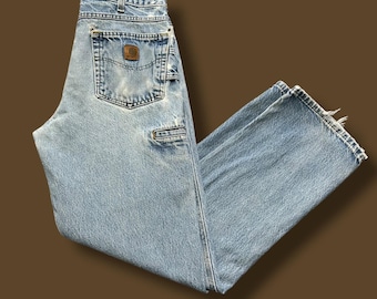 Vaqueros Carhartt vintage desgastados de los años 90, corte relajado, azul descolorido, 33 x 31