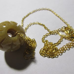 Yellow Jade Round Carved Bead Pendant with Gold Tone Chain, 18&quot;