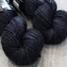 Worsted weight merino yarn. 100% Superwash Merino. Sweater weight yarn. Medium Weight yarn. Midnight. Semi-Solid Yarn. Tonal Yarn Black Yarn