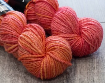 Worsted weight merino yarn. 100% Superwash Merino. Sweater weight yarn. Medium Weight yarn. Tonal Coral. Semi-Solid yarn. | It's A Trap LGW