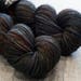 Worsted weight merino yarn. 100% Superwash Merino. Sweater weight yarn. Medium Weight yarn. Foundry. Rust and Navy multicolored yarn