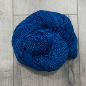 Canadian Hand-dyed yarn 80/20 Superwash Merino/Nylon Sock Yarn Fingering weight. Tonal Yarn. Semi-Solid Blue Yarn | Bigger on the Inside EDS